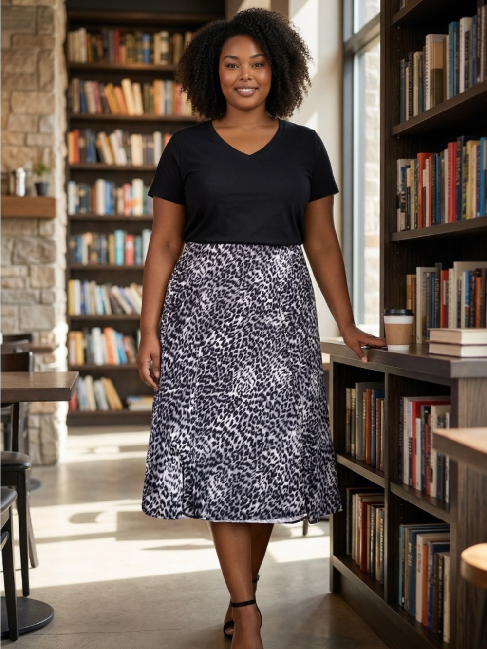 Chico’s ladies light gray leopard print midi skirt (Size 3)